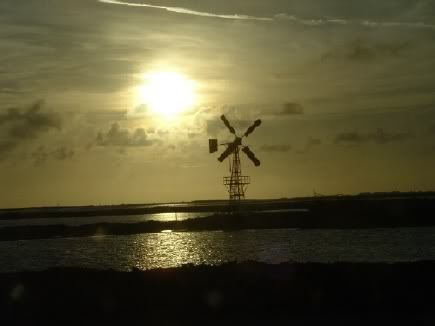 sunset and windmill at southern end of island