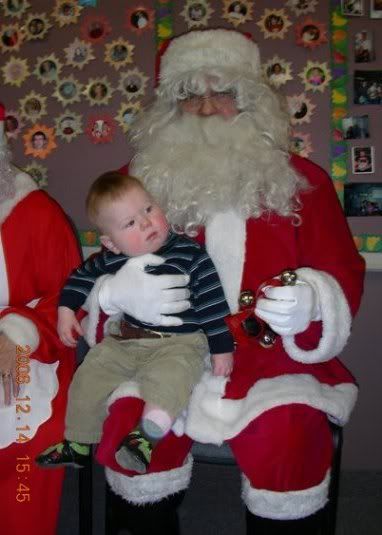 Riker's first pic with Santa