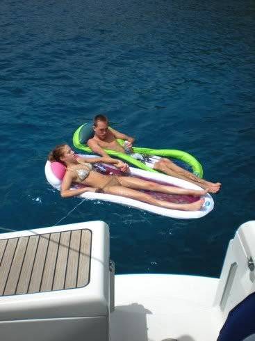 Boy and courtney on the rafts off norman Island