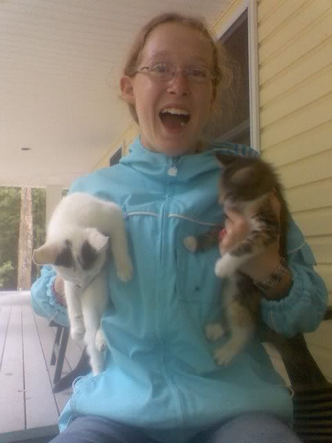 Annemarie loves the kitties..I am most certain she was laughing