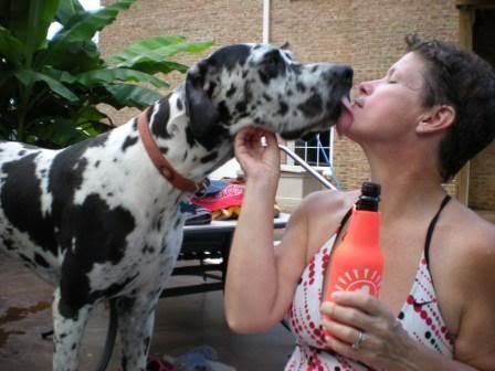 Mozart loves his mommy - or is trying to steal the beer